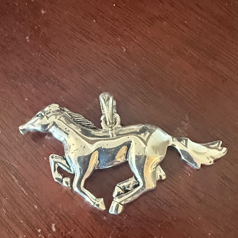 Horse, silver town necklace pendant 2 inches wide perfect condition